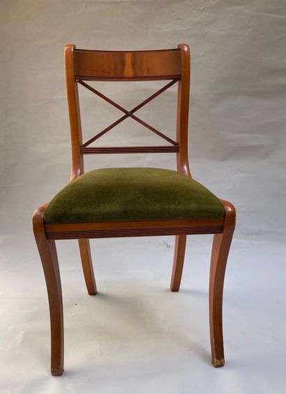 null Four chairs with frames in varnished wood, back with openwork cross. Upholstery...