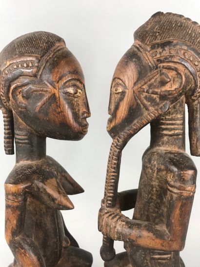 null Couple of Baoule type statues, Ivory Coast

Wood with brown patina, pigments

Height...