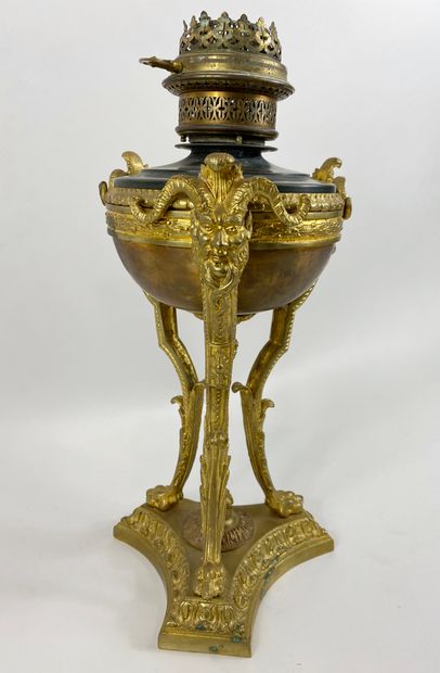 null A cassolette mounted as an oil lamp in bronze and gilded brass with a ram's...