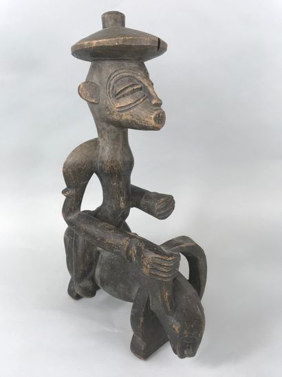 null Statuette representing a Senufo horseman, Ivory Coast

Wood with brown patina

Height...