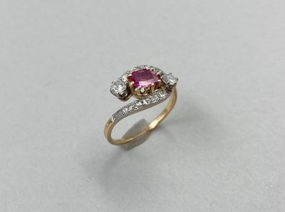 null Ring Vous Moi two 18k golds centered of an oval ruby accosted by two diamonds...