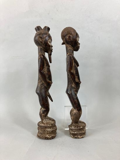null Couple de statuettes de type Baoule, Côte d’Ivoire

Bois à patine brune, pigments

Haut....