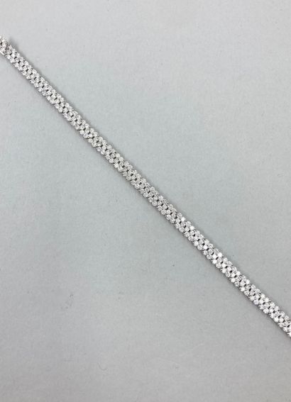null Ribbon bracelet in 18k white gold formed by a line of triangular motifs each...