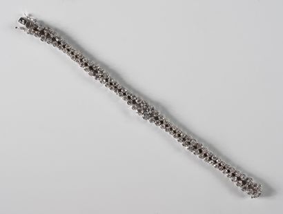 null Bracelet in 18k white gold composed of two lines of diamonds for approximately...