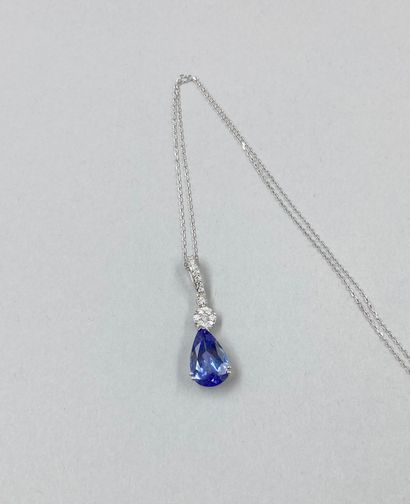 null 18k white gold pendant set with a pear-shaped tanzanite of 3,85 ct surmounted...