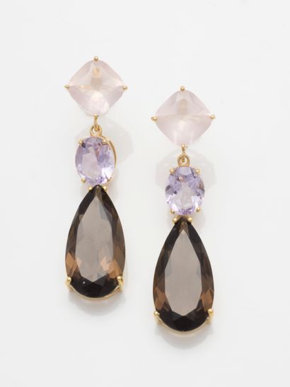 null Pair of vermeil earrings set with a cushion-cut rose quartz holding an oval...