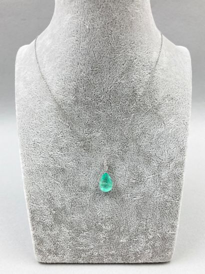 null 18k white gold pendant set with a 2.05 ct pear cut emerald (probably from Colombia)...