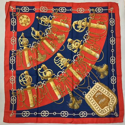 null HERMÈS Paris.

Printed silk square titled "Cliquetis", with dominant red, blue...
