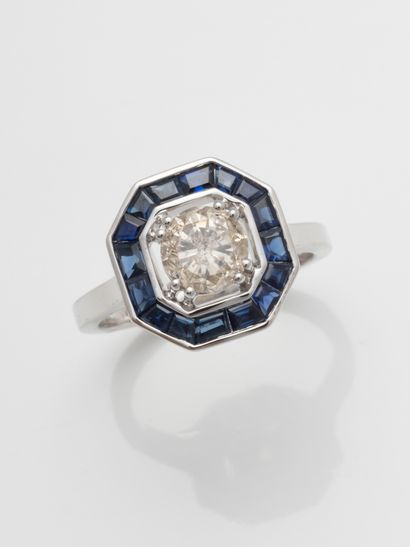 null Ring in 18k white gold, the octagonal bezel centered on a diamond of 1.10cts...