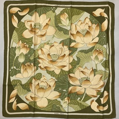 null HERMÈS Paris.

Printed silk square titled "Lotus Flowers", with green dominance.

Good...