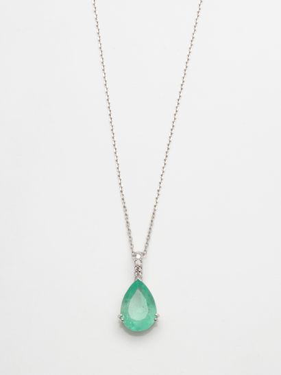 null 18k white gold pendant set with a 2.05 ct pear cut emerald (probably from Colombia)...