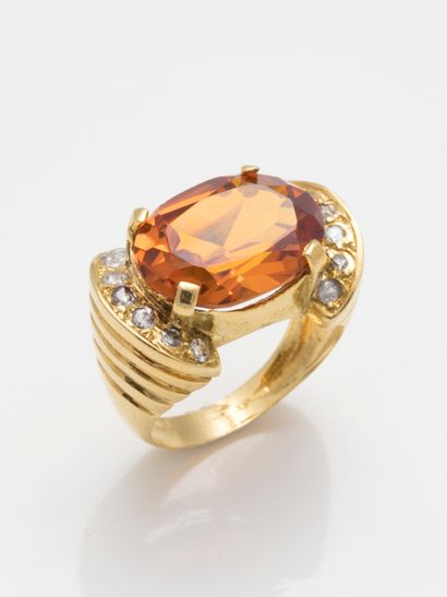null 18k yellow gold ring, the ring topped by a beautiful citrine with diamonds

Gross...