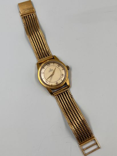 OMEGA 

Bracelet watch in 18k yellow gold....
