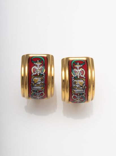 null HERMES Paris

Pair of gold-plated and enamel ear clips with red background....