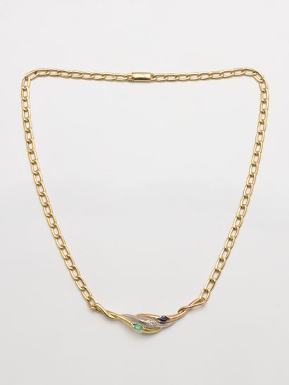 null 18k yellow gold necklace holding a three gold movement set with a navette diamond,...