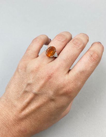 null Ring in 18k white gold with a fire opal of 3.50cts and diamonds.

Gross weight:...