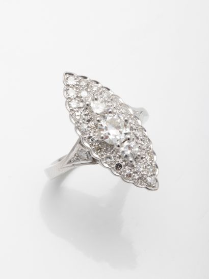 null Marquise ring in rhodium-plated 18k white gold set with a central old-cut diamond...
