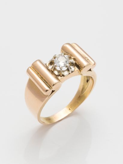null Tank ring in 18k yellow gold with a half-cut diamond of 0.30ct flanked by scrolling...