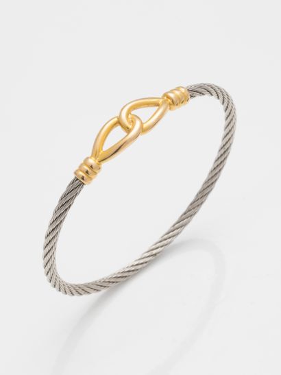null Bracelet composed of a twisted steel wire and simulated clasp in 18k yellow...