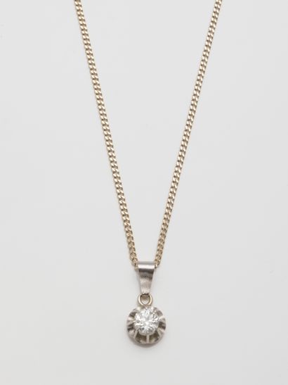 null Platinum pendant set with a half-cut diamond of about 0.45cts in a ruffled setting.

ART...