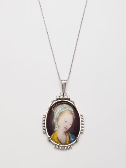 null 
18k white gold and diamond pendant surrounding the Virgin Mary on a porcelain...