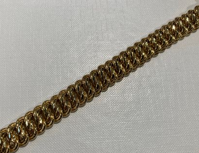 null 
Bracelet en or jaune 18k à mailles américaines. 

Poids : 23,10gr
