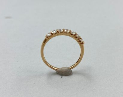 null Half wedding ring in 18k yellow gold set with a line of 7 diamonds.

Gross weight:...
