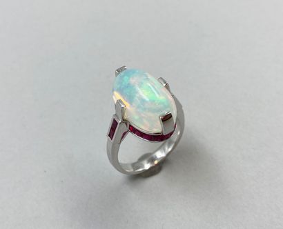 null 18k white gold ring set with a large opal cabochon of about 8 ct in a geometrical...