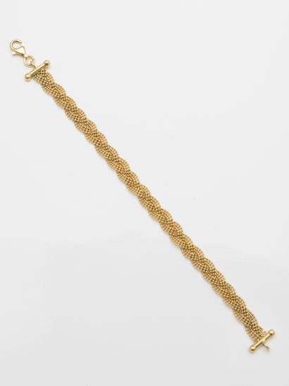 null 
Elegant flexible bracelet with 18k yellow gold links with intertwined grainetis.




Circa...