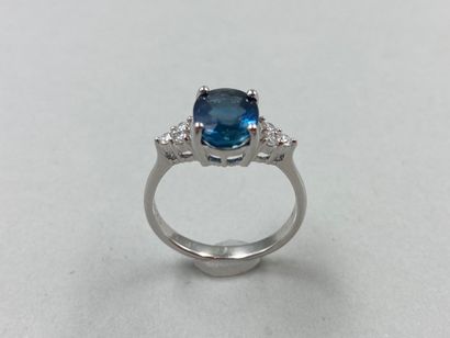 null 18k white gold ring set with a 2.92ct Vivid Blue sapphire and diamonds.

Gross...
