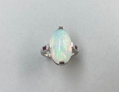 null 18k white gold ring set with a large opal cabochon of about 8 ct in a geometrical...