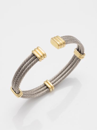 null Bracelet composed of three twisted steel wire and 18k yellow gold clasps in...