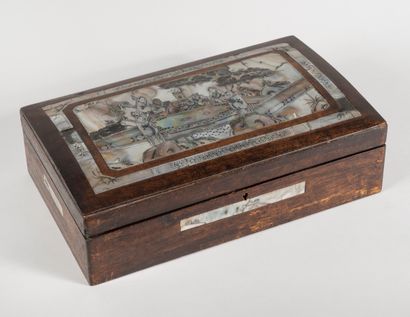 null CHINA, 20th century 

Fruitwood chest, the lid decorated with a tea ceremony...