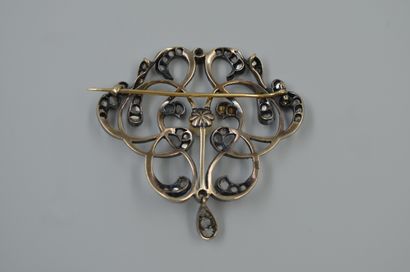 null 18k yellow gold and silver brooch with openwork interlacing design scratched...