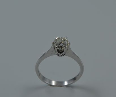 null Solitaire in 18k white gold with a half-size diamond of about 1ct. 

Style ART...