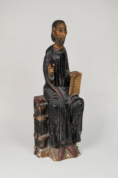 null CHRIST CALLED PANTOCRATOR finely carved and tinted in black, represented sitting...