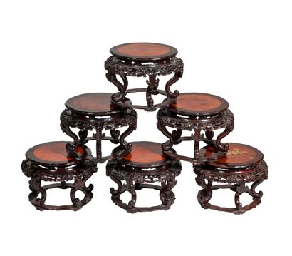 null CHINA, 20th century

Six circular stools with curved legs decorated with stylized...