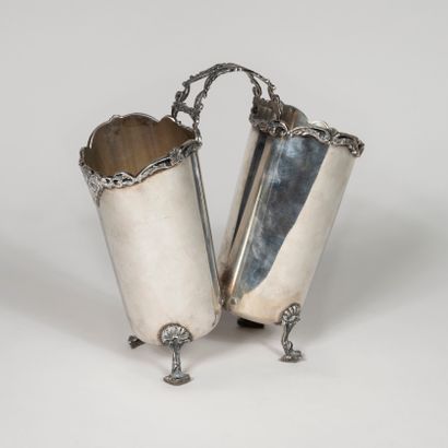 null Double vase or display in silver, the catch formed of openwork rocaille motives.

Height...