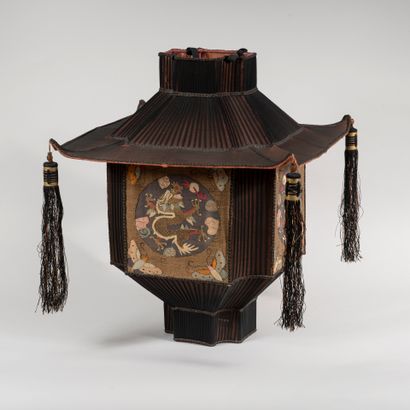 null 
CHINA, circa 1900 two lanterns

- Black lantern decorated on each side with...