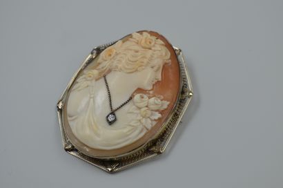 null 
14k white gold brooch with a cameo representing a woman in profile with flowers,...