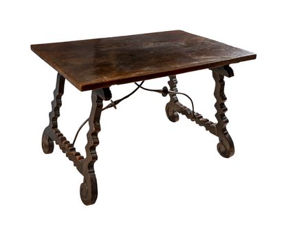 null "Spanish table" in natural and stained walnut, wrought iron, from Spain in the...