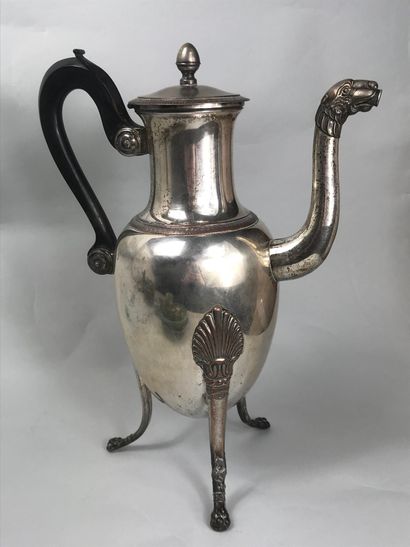 null Silver plated metal jug decorated with friezes of water leaves and palmettes....