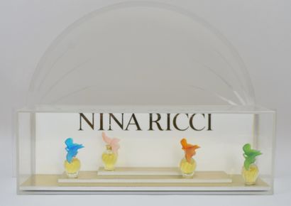 null NINA RICCI " The Air of Time ".
Rare altuglas display, titled, decorated with...