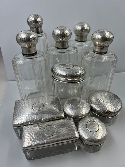 null TOILETTE HOLDER in cut crystal with hammered silver stoppers and lids, numbered,...