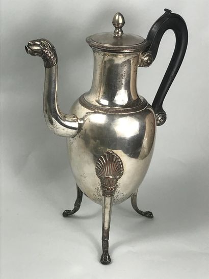null Silver plated metal jug decorated with friezes of water leaves and palmettes....
