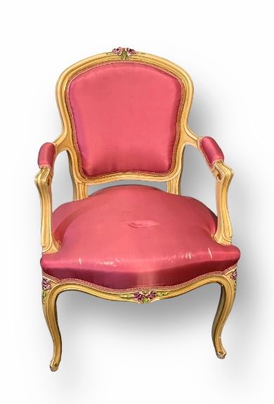 null Pair of medallion armchairs, one lined with pink fabric, the other green. Beige...