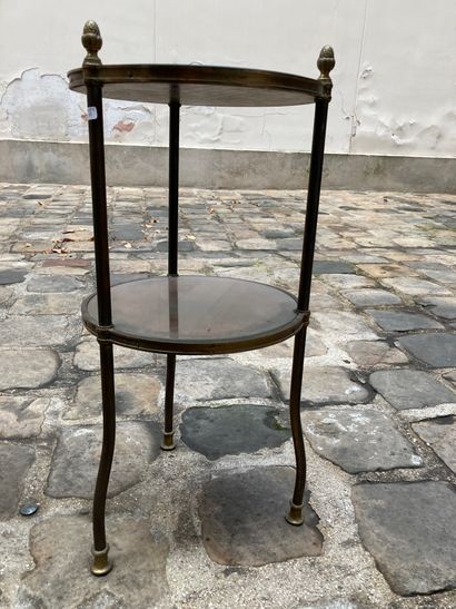 null Pair of small pedestal tables with two circular wooden trays, covered with leather...