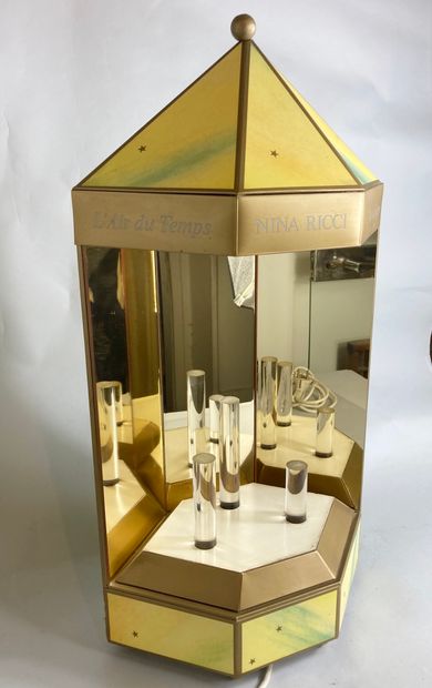 null NINA RICCI "L'Air du Temps
Rare titled display, with lighting decorated with...