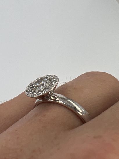 null 14k white gold ring set with a 1ct brilliant-cut diamond in a diamond setting....