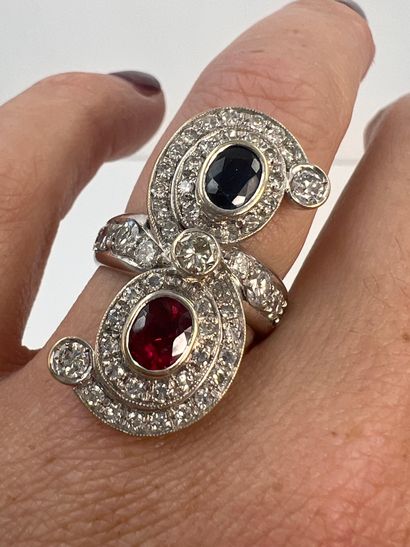 null Vous moi ring in 18k white gold set with an oval ruby and a sapphire in a double...